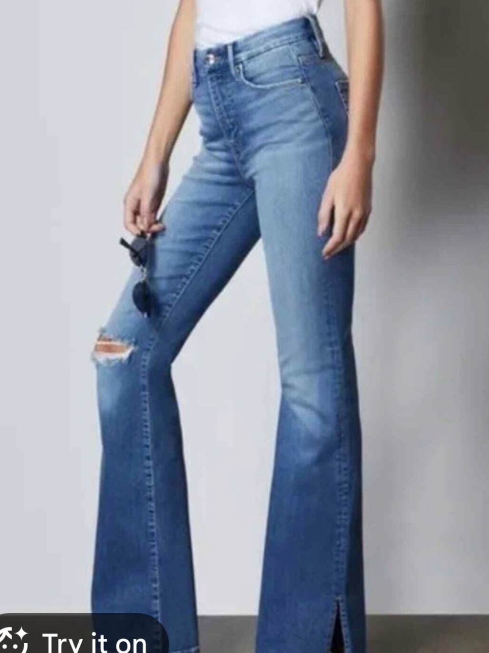 Good American Dark Blue Good Flare Jeans with Distressed Knee